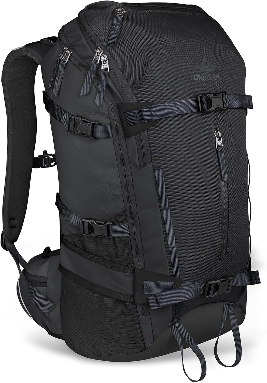 Black Unigear 30L ski and snowboard backpack, front view with straps adjusted on snow.